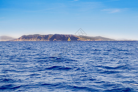 伊比萨从地中海观察的埃尔斯弗里斯假期晴天海岸派对地平线胰岛旅游海洋岩石观光图片