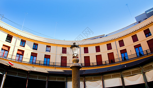 位于巴伦西亚市中心广场的历史性历史正方形传统城市蓝色店铺晴天地标古董图片