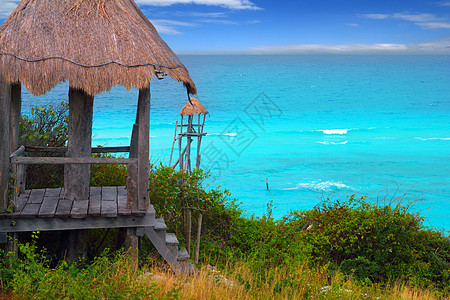 加勒比海平面松绿石海阳伞海拔电缆乐趣热带假期太阳植物海滩海洋图片