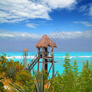 加勒比海平面松绿石海假期小屋风险太阳阳伞海岸滑索旅游热带植物图片