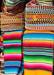 墨西哥色兰花色彩多彩的堆叠和焦蓝帽子图片