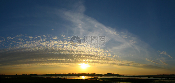 海日日落反射旅行橙子蓝色海浪天气波浪海滩支撑阳光图片