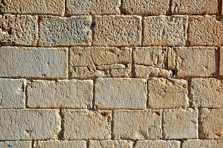 城堡泥石墙雕刻的石头行图案纹理石工石墙警卫岩石建筑师大理石水泥瓦砾建筑学墙纸图片