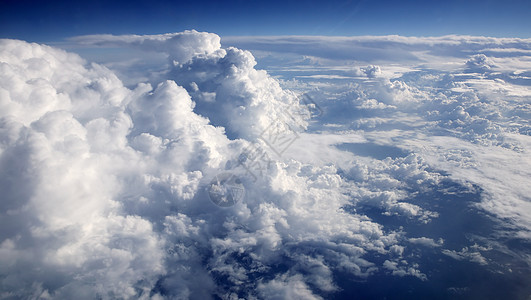 从航空飞机上看到蓝色空中云层阳光天气气候太阳环境晴天天空云景天堂水分图片