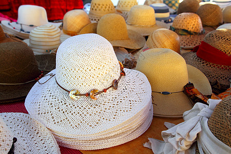 市场手工艺商店的帽子安排销售店铺工匠织物精神旅游纪念品工艺稻草文化图片