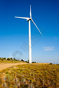 金山中的风力运动车环境电机蓝色翅膀天空公园力量生态绿色国家图片