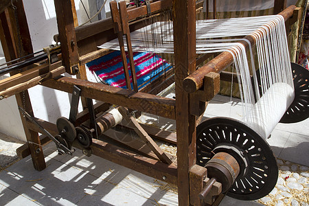 古古老的旋翼机工艺纺织品织物操作民间针织工匠织工机器艺术图片