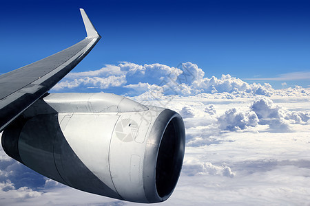 机翼飞机涡轮机飞行晴天阳光蓝色航班天气水分天堂青色气候翅膀图片