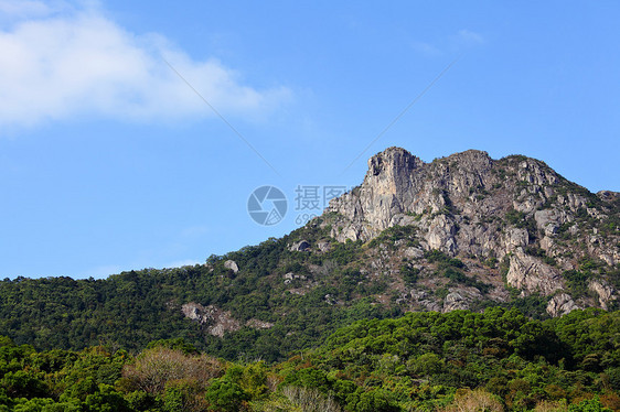 狮子石 香港精神的象征天空岩石城市市中心蓝色地标狮子头脑晴天绿色图片