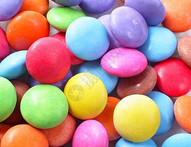 彩色糖果中毒巧克力小吃彩虹着色剂团体水平白色玩具绿色图片