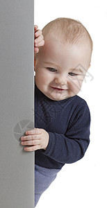 持有垂直标志的幼儿蓝色灰色手指儿童手表微笑单身孩子人士白色图片