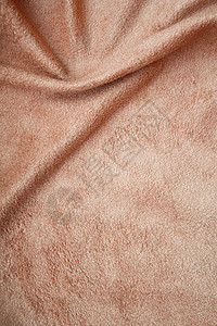 Beige 天鹅绒织物作为背景布料曲线艺术折痕生产墙纸投标衣服版税涟漪图片