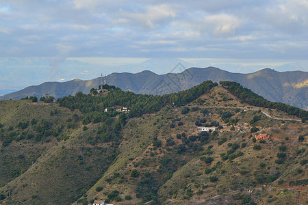 马拉加山山脉建筑学房子爬坡丘陵建筑晴天太阳图片