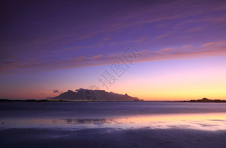 南非海滩的表观南非海滩日落天空反思桌景风景城市奇观海洋灯光太阳旅行图片