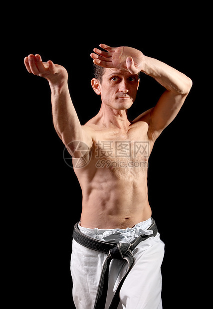 空手道 和服里有黑人背景的人活动斗争跆拳道力量柔术武术攻击身体腰带男性图片