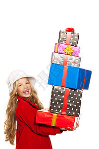 拿着许多礼物的女孩 在她手上堆叠庆典快乐包装童年幸福惊喜生日外套情感帽子图片
