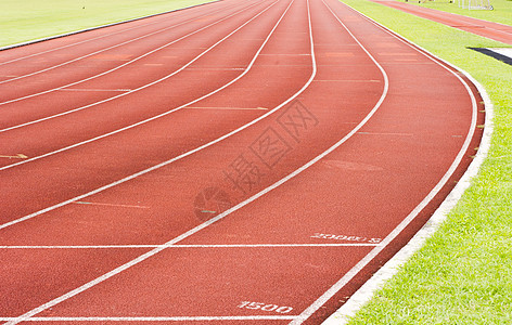 正在运行轨道场地锻炼运动员体育场挑战车道竞赛曲线竞争运动图片