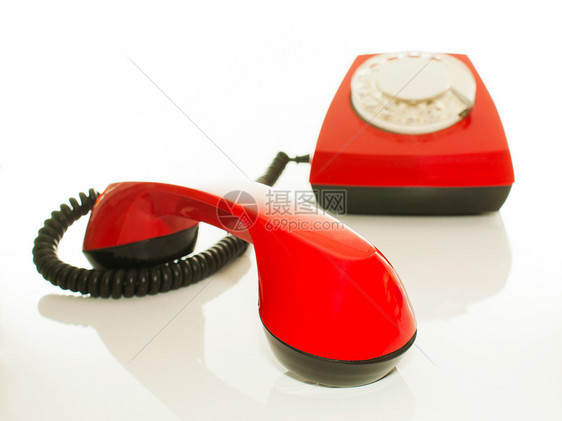 红式老旧电话  联系我们的概念塑料电讯技术数字拨号古董风格复古听筒旋转图片