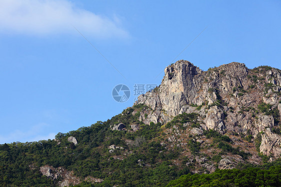 香港的狮子石狮子蓝色晴天地标精神城市天空市中心岩石绿色图片