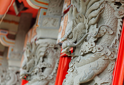 寺庙中的龙雕像建筑学皇帝金子异国石头装饰品力量情调青铜文化图片