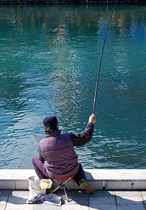 在河底 奥赫里德湖 溪水和海洋上捕鱼渔夫太阳闲暇渔民运动图片