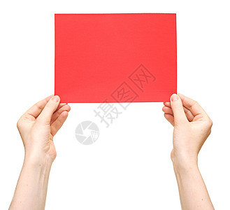 白色背景上孤立的手和红纸图片