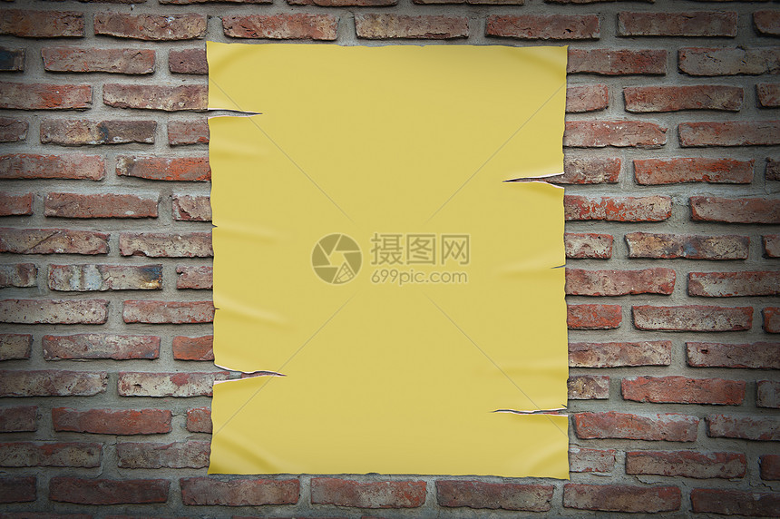 砖墙上的旧纸羊皮纸材料瓦工阴影海报裂缝黄色边缘纸板风化图片