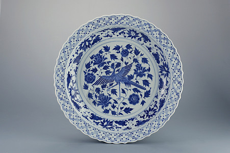 古董板装饰商品瓷器风格制品历史陶瓷盘子花朵蓝色背景图片
