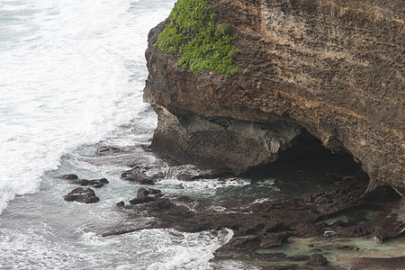 巴厘 乌卢瓦图海景岩石海洋白色热带悬崖天空假期气泡海浪背景图片