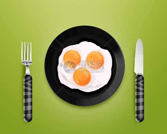 三颗炸鸡蛋在一块盘子上图片