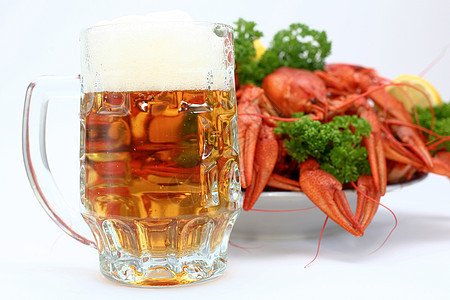 啤酒和龙虾午餐桌子小龙虾海洋餐厅红色爪子渔业橙子美食图片