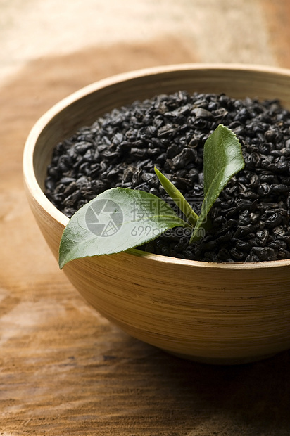 清茶和干茶享受药品白毫文化白色叶子勺子草本单宁黑色图片