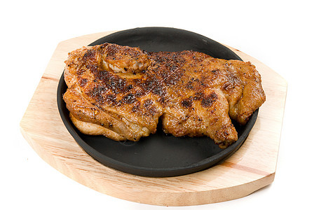 美味的烤鸡炙烤油炸身体香料家禽胡椒小吃烹饪厨房午餐图片