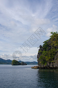 海云 陆海平原天空土地阳光旅行赤道风景海洋晴天绿色蓝色背景图片