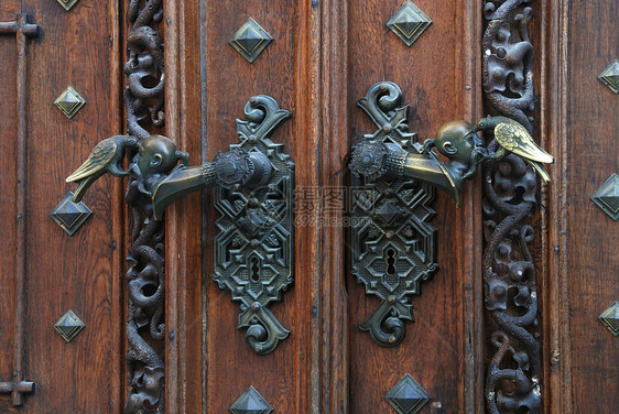 古老的门把手锁孔房子建筑学历史入口教会喇叭城堡大教堂褪色图片