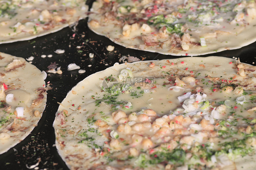 锅上日日食烹饪饼子特产食物细绳海藻地区乌贼猪肉图片