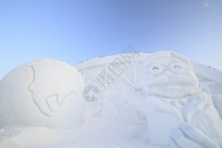 日本日积雪节蓝天冻结雕刻季节雕像雪祭图片