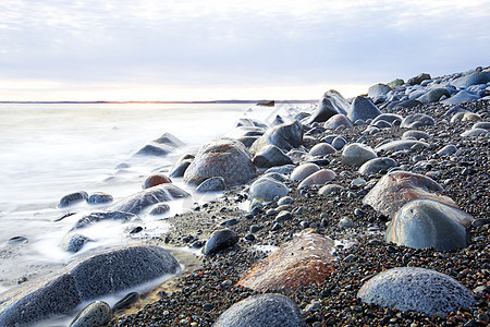 莫埃伦 挪威滚动海洋薄雾反射石头峡湾风景太阳天空海岸图片
