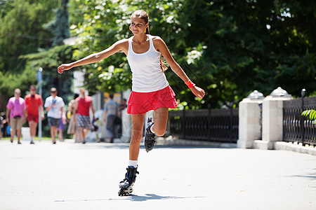 滚筒女性速度快乐活动情绪轮滑爱好运动滑冰运动员图片