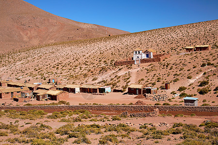 智利Machuca村风景旅游村庄高原土坯入口稻草石头教会爬坡图片