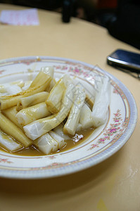 中国大米卷香港式野餐棕榈叶子餐厅盘子食物文化手工烹饪乐队图片