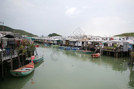 香港Tai O渔业村棚户区木头钓鱼爬坡旅行风化高跟鞋住宅蓝色村庄图片