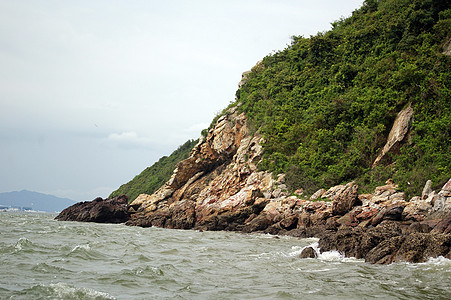 香港的沿海风景旅游泡沫晴天石头卵石海岸海洋支撑天空海浪图片