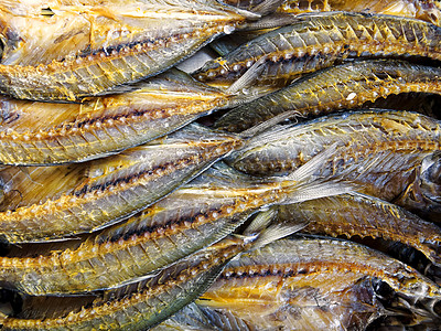 干鱼市场食物盐渍背景食品小鱼海鲜尾巴美味图片
