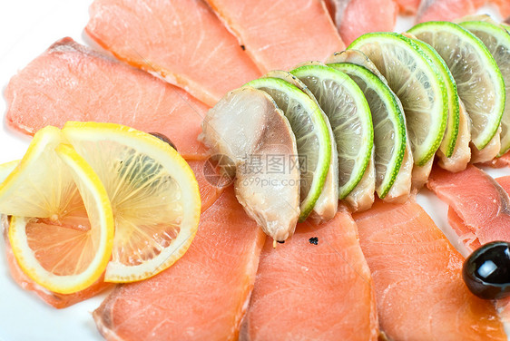 鱼群特写鲷鱼橙子小吃沙拉叶子午餐营养美食熏制海鲜图片