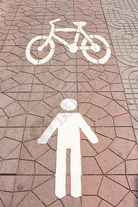 步行和自行车标志运输路面运动城市小路男人交通行人地面车道图片