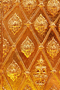 在庙墙上的金色泰国图案设计建筑墙纸风格寺庙装饰金子艺术佛教徒宗教建筑学图片