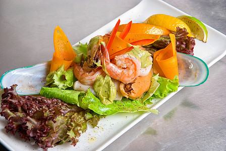 海食沙拉菜盘贝类蔬菜沙拉海鲜宏观午餐美食螃蟹盘子胡椒图片