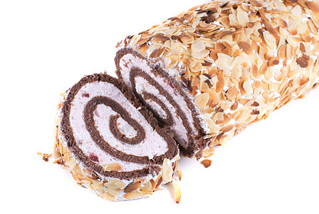 瑞士卷甜点奶制品海绵巧克力烹饪糖果日志树叶产品坚果图片