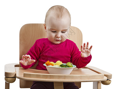 以高椅子吃饭的幼儿菜花木材红色食物营养品蔬菜儿童小菜白色木头图片